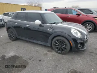 2017 MINI Hardtop 4 Door Cooper with VIN WMWXU1C30H2E19304, listed as a Copart auction lot 51008575 with 34,526 mi miles and Salvage Title. Bid and sale history available at DreamBid. Image 4.