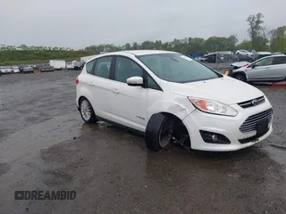 2013 Ford C-Max SEL z VIN 1FADP5BU4DL550533, wystawiony jako IAAI lot #42243902 z przebiegiem 125 779 mil mil oraz . Historia ofert i sprzedaży dostępna na DreamBid. Obrazek 1.