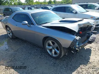 2014 Dodge Challenger R/T z VIN 2C3CDYBT9EH139932, wystawiony jako IAAI lot #42261252 z przebiegiem 95 241 mil mil oraz . Historia ofert i sprzedaży dostępna na DreamBid. Obrazek 1.