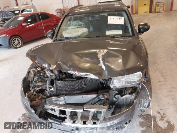 2016 Jeep Compass Sport with VIN 1C4NJDBB3GD805857, listed as a IAAI auction lot 42330519 with 135,578 mi miles and . Bid and sale history available at DreamBid. Image 6.