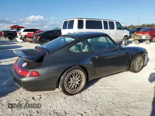 1995 Porsche 911 Carrera with VIN WP0AA2994SS323280, listed as a Copart auction lot 75304104 with 105,675 mi miles and Salvage Title. Bid and sale history available at carsss.com. Image 3.