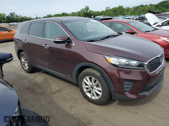 2019 Kia Sorento LX z VIN 5XYPGDA3XKG558803, wystawiony jako Copart lot #57885915 z przebiegiem 70 055 mil mil oraz Szkoda całkowita • Salvage title. Historia ofert i sprzedaży dostępna na DreamBid. Obrazek 4.