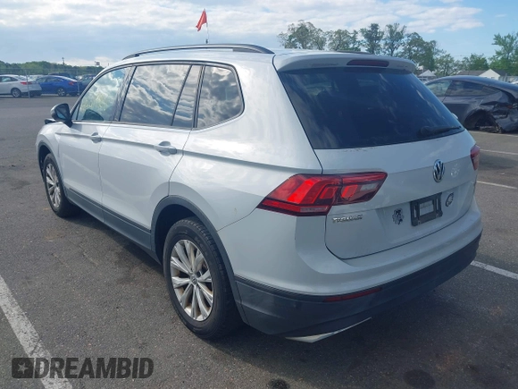 2018 Volkswagen Tiguan S with VIN 3VV0B7AX5JM025815, listed as a IAAI auction lot 42219906 with 168,122 mi miles and . Bid and sale history available at DreamBid. Image 3.