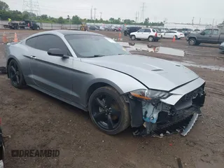 2023 Ford Mustang EcoBoost with VIN 1FA6P8TH9P5105743, listed as a IAAI auction lot 42525135 with 31,116 mi miles and . Bid and sale history available at DreamBid. Image 1.