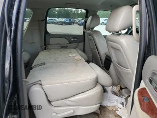 2012 Chevrolet Suburban LT с VIN 1GNSCJE01CR214873, выставлен на аукционе Copart как лот 58316385 с пробегом 266 398 миль миль и Списание • Salvage title. История ставок и продаж доступна на DreamBid. Изображение 11.