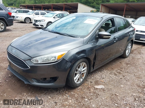 2016 Ford Focus SE z VIN 1FADP3F2XGL397092, wystawiony jako IAAI lot #42619802 z przebiegiem 232 252 mil mil oraz . Historia ofert i sprzedaży dostępna na DreamBid. Obrazek 2.
