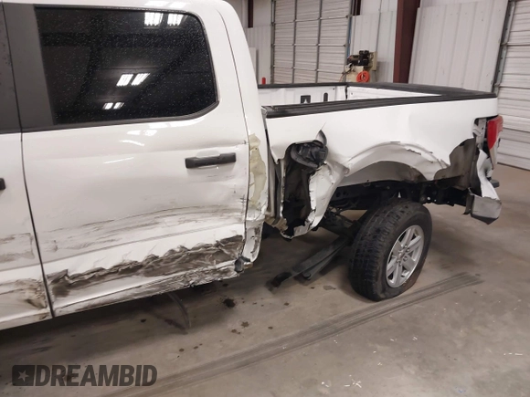 2021 Ford F-150 XL with VIN 1FTEW1C57MFA71572, listed as a IAAI auction lot 41549588 with 82,389 mi miles and . Bid and sale history available at carsss.com. Image 6.