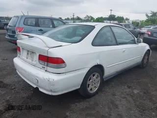 2000 Honda Civic EX z VIN 1HGEJ8241YL071110, wystawiony jako IAAI lot #42361696 z przebiegiem 322 543 mil mil oraz . Historia ofert i sprzedaży dostępna na DreamBid. Obrazek 4.