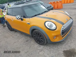 2015 MINI Hardtop with VIN WMWXM5C58FT942888, listed as a IAAI auction lot 42226391 with 61,935 mi miles and . Bid and sale history available at DreamBid. Image 1.