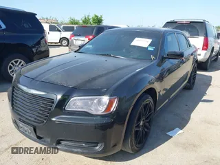 2013 Chrysler 300 with VIN 2C3CCAAGXDH660851, listed as a IAAI auction lot 41970721 with 112,017 mi miles and . Bid and sale history available at carsss.com. Image 2.
