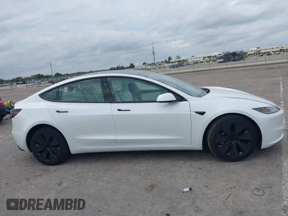2025 Tesla Model 3 Long Range with VIN 5YJ3E1EA0SF932385, listed as a IAAI auction lot 41772613 with 1,683 mi miles and . Bid and sale history available at carsss.com. Image 13.