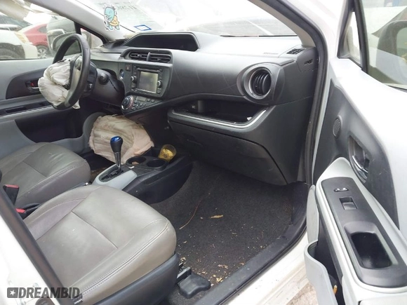 2014 Toyota Prius c One with VIN JTDKDTB31E1559712, listed as a IAAI auction lot 41286514 with 173,321 mi miles. Bid and sale history available at carsss.com. Image 5.