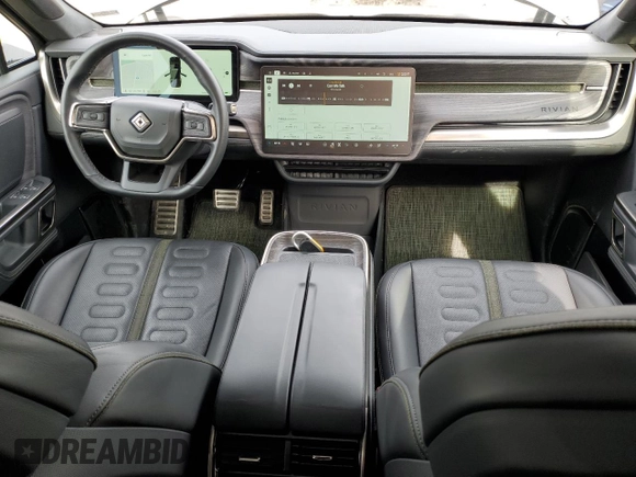 2022 Rivian R1S Launch Edition z VIN 7PDSGABL4NN000393, wystawiony jako Copart lot #44218005 z przebiegiem 26 598 mil mil oraz Szkoda całkowita • Salvage title. Historia ofert i sprzedaży dostępna na DreamBid. Obrazek 8.