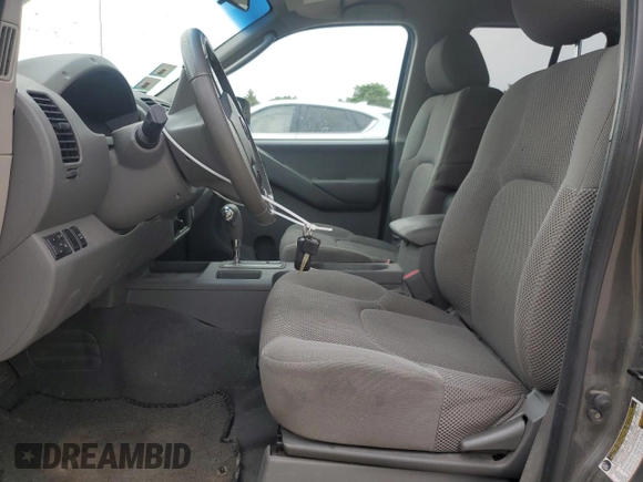 2008 Nissan Frontier LE with VIN 1N6AD09W28C407454, listed as a Copart auction lot 58741015 with 74,548 mi miles and Salvage title. Bid and sale history available at DreamBid. Image 7.