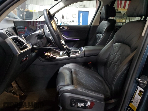 2023 BMW X7 xDrive40i with VIN 5UX23EM04P9P66602, listed as a Copart auction lot 51428015 with 65,671 mi miles and Salvage Title. Bid and sale history available at carsss.com. Image 7.