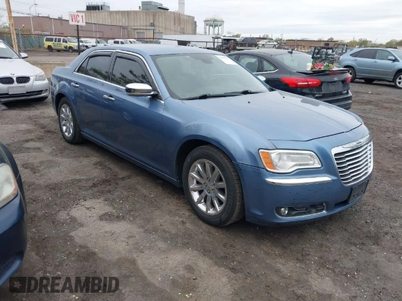 2011 Chrysler 300 with VIN 2C3CA6CT5BH575023, listed as a IAAI auction lot 42090856 with 200,309 mi miles. Bid and sale history available at carsss.com. Image 1.