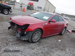 2012 Cadillac CTS with VIN 1G6DM5E32C0116197, listed as a IAAI auction lot 41169118 with 117,062 mi miles and . Bid and sale history available at DreamBid. Image 2.