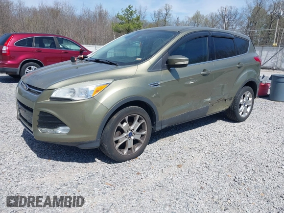2013 Ford Escape SEL with VIN 1FMCU0HX3DUB37785, listed as a IAAI auction lot 41863069 with 179,508 mi miles. Bid and sale history available at carsss.com. Image 2.