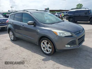 2013 Ford Escape SE with VIN 1FMCU0GXXDUD85470, listed as a IAAI auction lot 42142774 with 145,391 mi miles. Bid and sale history available at carsss.com. Image 1.