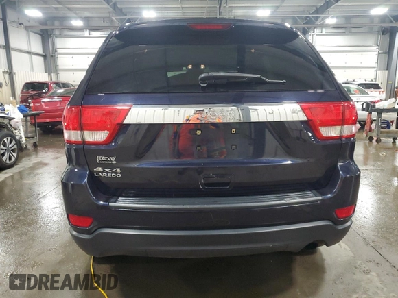 2011 Jeep Grand Cherokee Laredo with VIN 1J4RR4GG9BC555662, listed as a Copart auction lot 52447235 with 151,695 mi miles and Salvage Title. Bid and sale history available at carsss.com. Image 6.
