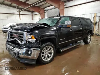 2015 GMC Sierra 1500 SLT with VIN 3GTU2VEJXFG517420, listed as a Copart auction lot 42144385 with 122,446 mi miles and Clean Title. Bid and sale history available at DreamBid. Image 1.
