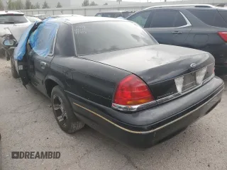 2000 Ford Crown Victoria LX с VIN 2FAFP74W1YX130479, выставлен на аукционе Copart как лот 53387815 с пробегом 166 089 миль миль и На запчасти • Non repairable. История ставок и продаж доступна на DreamBid. Изображение 2.