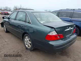 2003 Toyota Avalon XL with VIN 4T1BF28B73U272434, listed as a IAAI auction lot 42019673 with 231,796 mi miles and . Bid and sale history available at carsss.com. Image 3.
