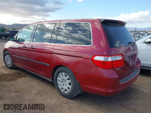 2005 Honda Odyssey LX with VIN 5FNRL38235B121653, listed as a IAAI auction lot 41704670 with 263,160 mi miles. Bid and sale history available at carsss.com. Image 3.