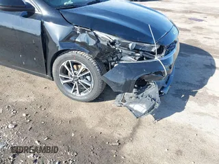 2023 Kia Forte LXS with VIN 3KPF24AD1PE511666, listed as a IAAI auction lot 41832551 with 112,005 mi miles and . Bid and sale history available at DreamBid. Image 6.