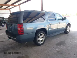 2009 Chevrolet Suburban LTZ with VIN 1GNFC36J29R293712, listed as a IAAI auction lot 42577800 with 202,593 mi miles and . Bid and sale history available at DreamBid. Image 4.