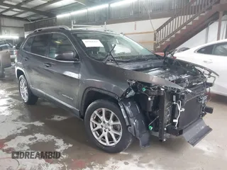 2016 Jeep Cherokee Latitude with VIN 1C4PJLCB1GW206686, listed as a IAAI auction lot 41568397 with 165,980 mi miles. Bid and sale history available at carsss.com. Image 13.