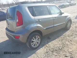 2012 Kia Soul + with VIN KNDJT2A68C7370716, listed as a IAAI auction lot 41726118 with 107,688 mi miles. Bid and sale history available at carsss.com. Image 4.