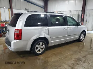 2010 Dodge Grand Caravan SXT with VIN 2D4RN5D1XAR268976, listed as a Copart auction lot 54587505 with 179,000 mi miles and Salvage Title. Bid and sale history available at DreamBid. Image 3.