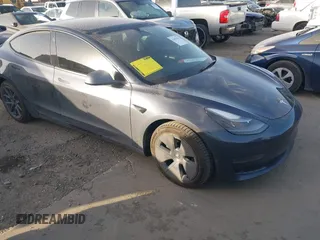 2022 Tesla Model 3 Long Range with VIN 5YJ3E1EB3NF264532, listed as a IAAI auction lot 41842044 with 42,280 mi miles. Bid and sale history available at carsss.com. Image 1.
