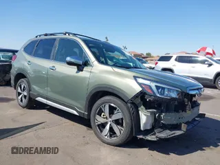 2019 Subaru Forester Touring with VIN JF2SKAWC4KH556604, listed as a IAAI auction lot 41991368 with 64,771 mi miles. Bid and sale history available at carsss.com. Image 1.