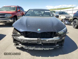 2021 BMW 8 Series M850i with VIN WBAGV8C00MCF55108, listed as a Copart auction lot 56305084 with 27,399 mi miles and Salvage Title. Bid and sale history available at carsss.com. Image 5.