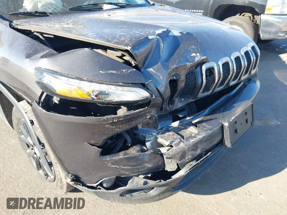 2016 Jeep Cherokee Latitude with VIN 1C4PJMCB8GW162224, listed as a IAAI auction lot 41847908 with 141,642 mi miles and . Bid and sale history available at carsss.com. Image 6.