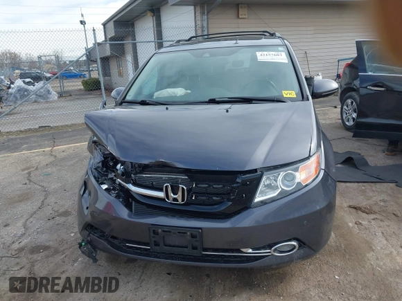 2016 Honda Odyssey Touring Elite z VIN 5FNRL5H99GB072860, wystawiony jako IAAI lot #42157603 z przebiegiem 221 449 mil mil oraz . Historia ofert i sprzedaży dostępna na DreamBid. Obrazek 12.
