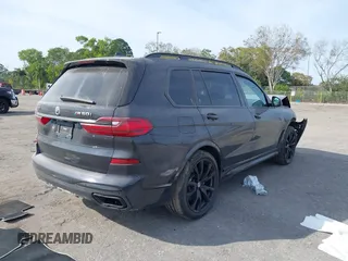 2022 BMW X7 M50i z VIN 5UXCX6C08N9M15818, wystawiony jako IAAI lot #41434065 z przebiegiem 52 740 mil mil oraz . Historia ofert i sprzedaży dostępna na DreamBid. Obrazek 4.