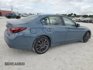 2024 Infiniti Q50 Red Sport 400 with VIN JN1FV7DP0RM660155, listed as a Copart auction lot 44143915 with 5,521 mi miles and Salvage Title. Bid and sale history available at DreamBid. Image 3.