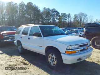 2002 Chevrolet Blazer LS z VIN 1GNDT13W32K146843, wystawiony jako IAAI lot #41497892 z przebiegiem 121 882 mil mil oraz . Historia ofert i sprzedaży dostępna na DreamBid. Obrazek 1.