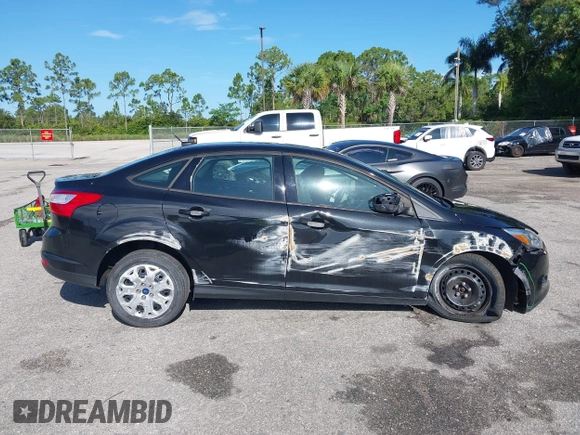 2012 Ford Focus SE with VIN 1FAHP3F22CL150631, listed as a IAAI auction lot 42594823 with 49,456 mi miles and . Bid and sale history available at DreamBid. Image 14.