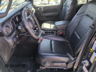 2023 Jeep Wrangler Sahara with VIN 1C4JJXP65PW661194, listed as a Copart auction lot 55729925 with 24,264 mi miles and Clean Title. Bid and sale history available at DreamBid. Image 7.