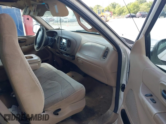 1999 Ford F-150 z VIN 1FTRX17W5XNB33627, wystawiony jako IAAI lot #41933365 z przebiegiem 207 118 mil mil oraz . Historia ofert i sprzedaży dostępna na DreamBid. Obrazek 5.
