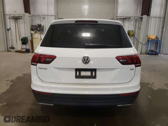 2018 Volkswagen Tiguan S with VIN 3VV1B7AX4JM118670, listed as a Copart auction lot 57055935 with 104,443 mi miles and Salvage title. Bid and sale history available at DreamBid. Image 6.