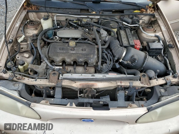 1997 Ford Escort LX z VIN 1FALP13P2VW326223, wystawiony jako Copart lot #74509294 z przebiegiem 55 265 mil mil oraz Szkoda całkowita • Salvage title. Historia ofert i sprzedaży dostępna na DreamBid. Obrazek 13.
