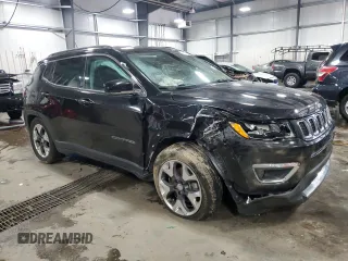 2020 Jeep Compass Limited with VIN 3C4NJCCB2LT169140, listed as a Copart auction lot 58001495 with 97,379 mi miles and Salvage title. Bid and sale history available at DreamBid. Image 4.
