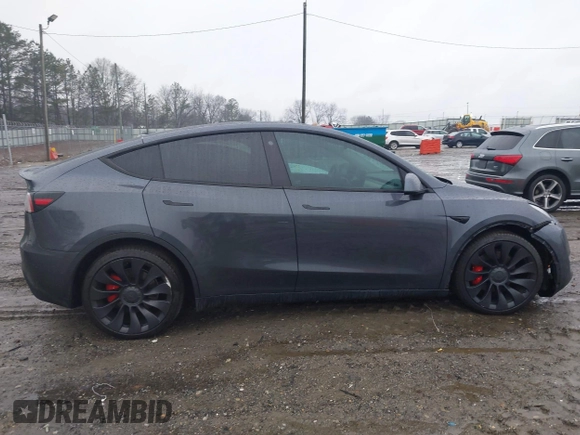 2022 Tesla Model Y Performance with VIN 7SAYGDEF1NF379167, listed as a IAAI auction lot 41429842 with 86,582 mi miles and . Bid and sale history available at DreamBid. Image 14.