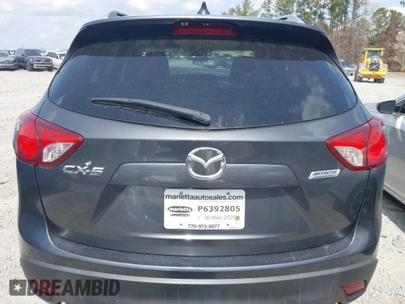 2015 Mazda CX-5 Touring with VIN JM3KE2CY2F0530204, listed as a IAAI auction lot 41788921 with 50,827 mi miles. Bid and sale history available at carsss.com. Image 16.