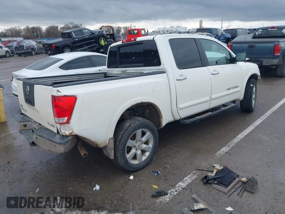 2012 Nissan Titan SL with VIN 1N6AA0EC7CN311109, listed as a IAAI auction lot 41420110 with 209,731 mi miles and . Bid and sale history available at DreamBid. Image 4.